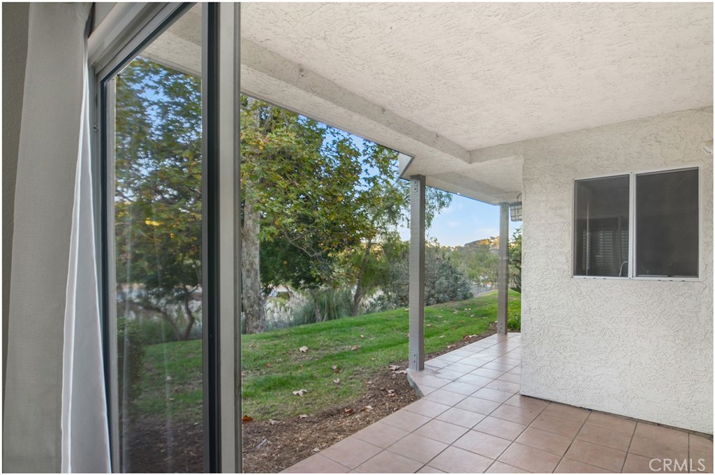 4 Corniche Drive, Unit B Dana Point, CA 92629 - Photo 8 of 41 a view of a room with window in front of a yard