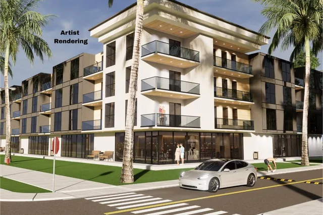 a view of swimming pool with palm trees