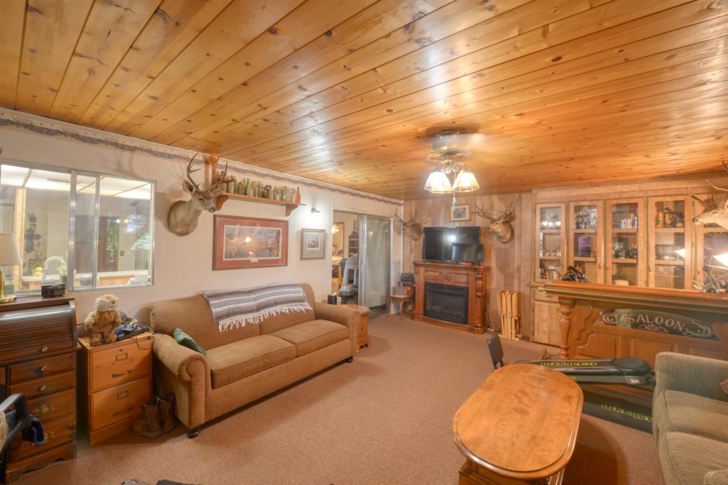 1471 Highway 33 Gustine, CA 95322 - Photo 44 of 57 a living room with furniture and a fireplace
