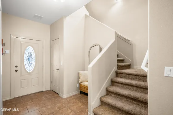 a view of entryway with wooden floor