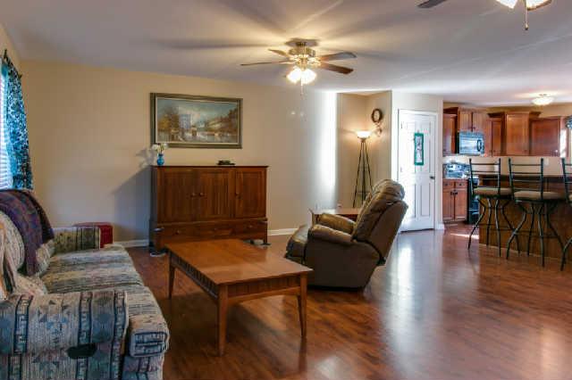 217 Red Top Road Indian Mound, TN 37079 - Photo 4 of 20 Large living room has beautiful laminate