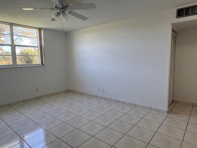 5500 Northwest 2nd Avenue, Unit 123 Boca Raton, FL 33487 - Photo 21 of 48 an empty room with a window