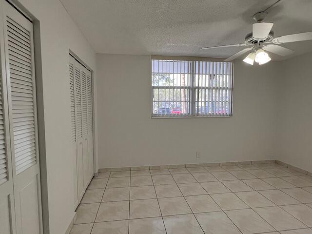 5500 Northwest 2nd Avenue, Unit 123 Boca Raton, FL 33487 - Photo 29 of 48 a view of an empty room with a window