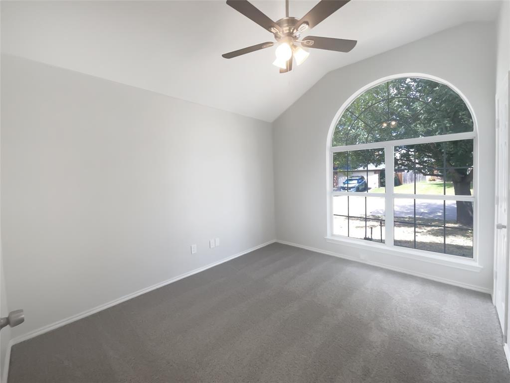 3724 Tulip Tree Drive Fort Worth, TX 76137 - Photo 20 of 30 an empty room with a large window