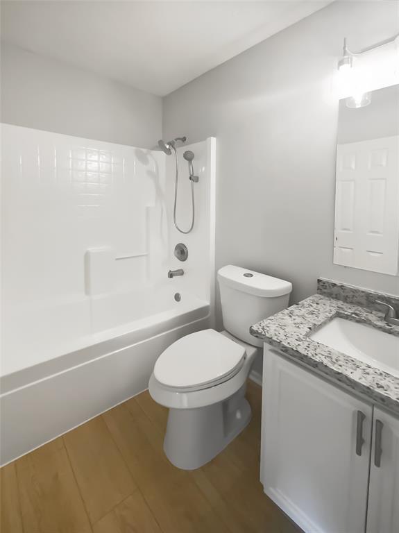 3724 Tulip Tree Drive Fort Worth, TX 76137 - Photo 29 of 30 a bathroom with a granite countertop toilet sink and shower