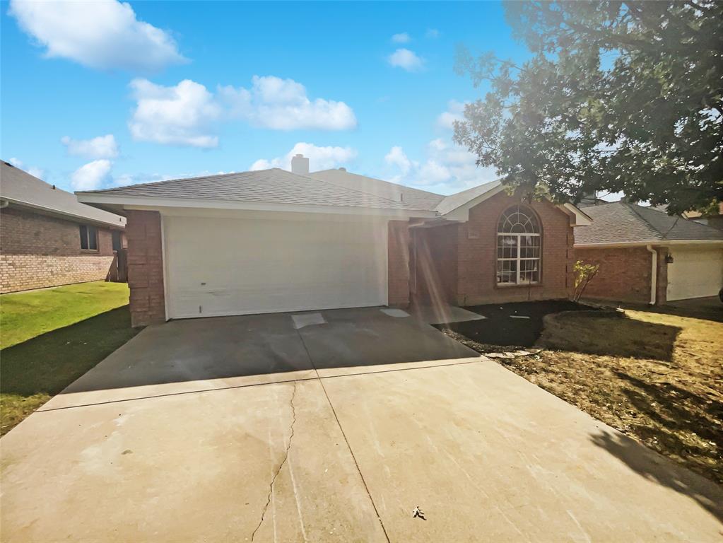 3724 Tulip Tree Drive Fort Worth, TX 76137 - Photo 3 of 30 a view of a house with a snow in the yard