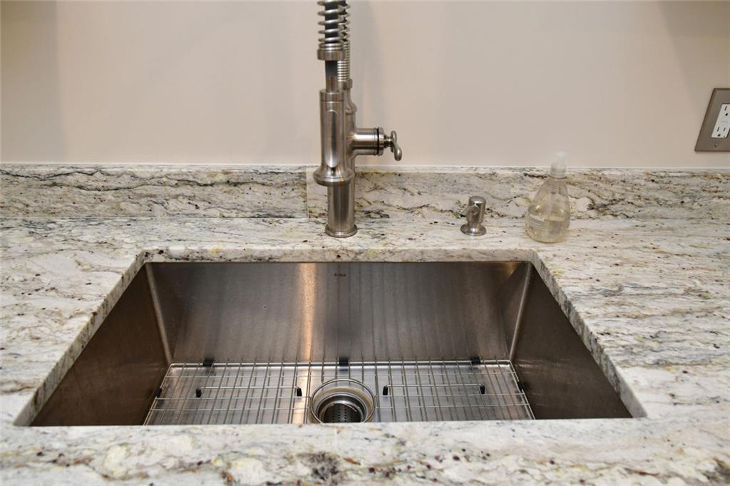 1767 Honey Tree Place Hoschton, GA 30548 - Photo 25 of 54 a close view of sink and tap