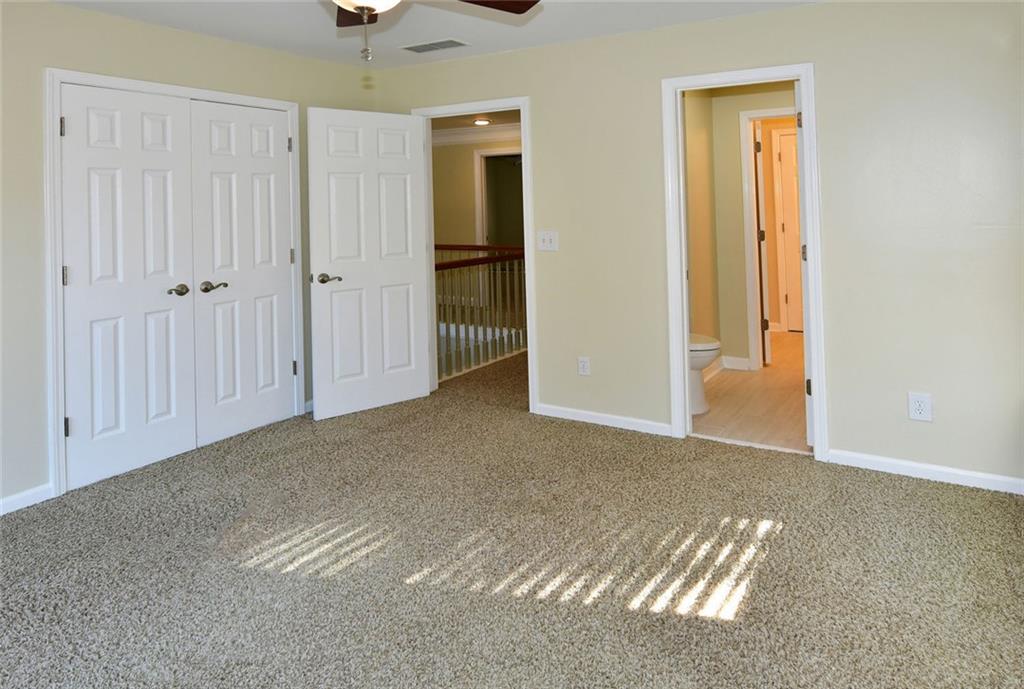 1767 Honey Tree Place Hoschton, GA 30548 - Photo 43 of 54 a view of a room with an empty space