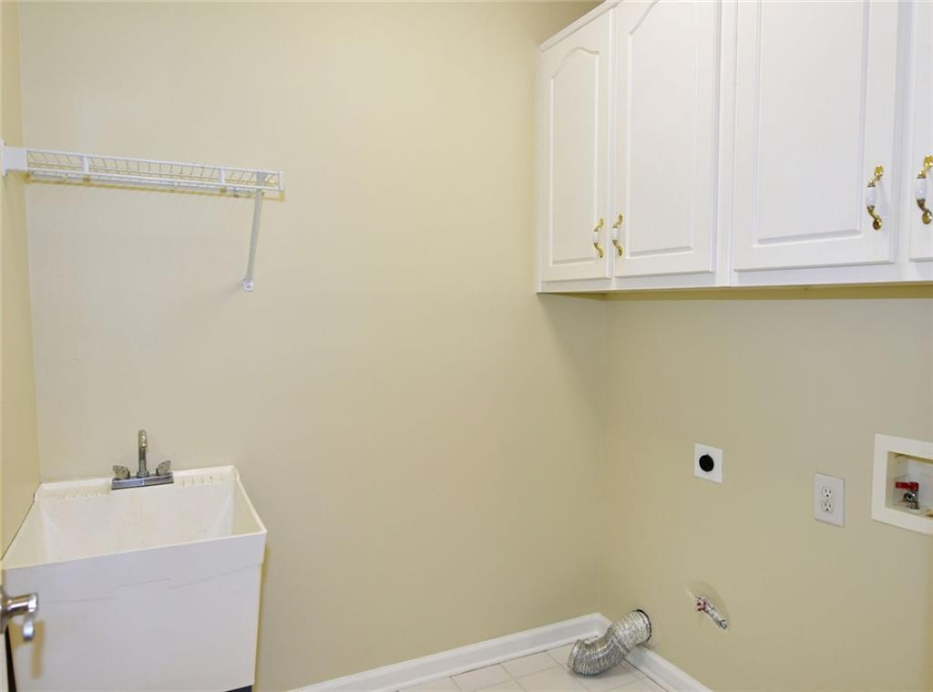1767 Honey Tree Place Hoschton, GA 30548 - Photo 46 of 54 a bathroom with a sink and a vanity