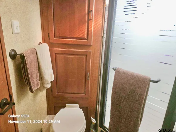 a bathroom with a sink and toilet
