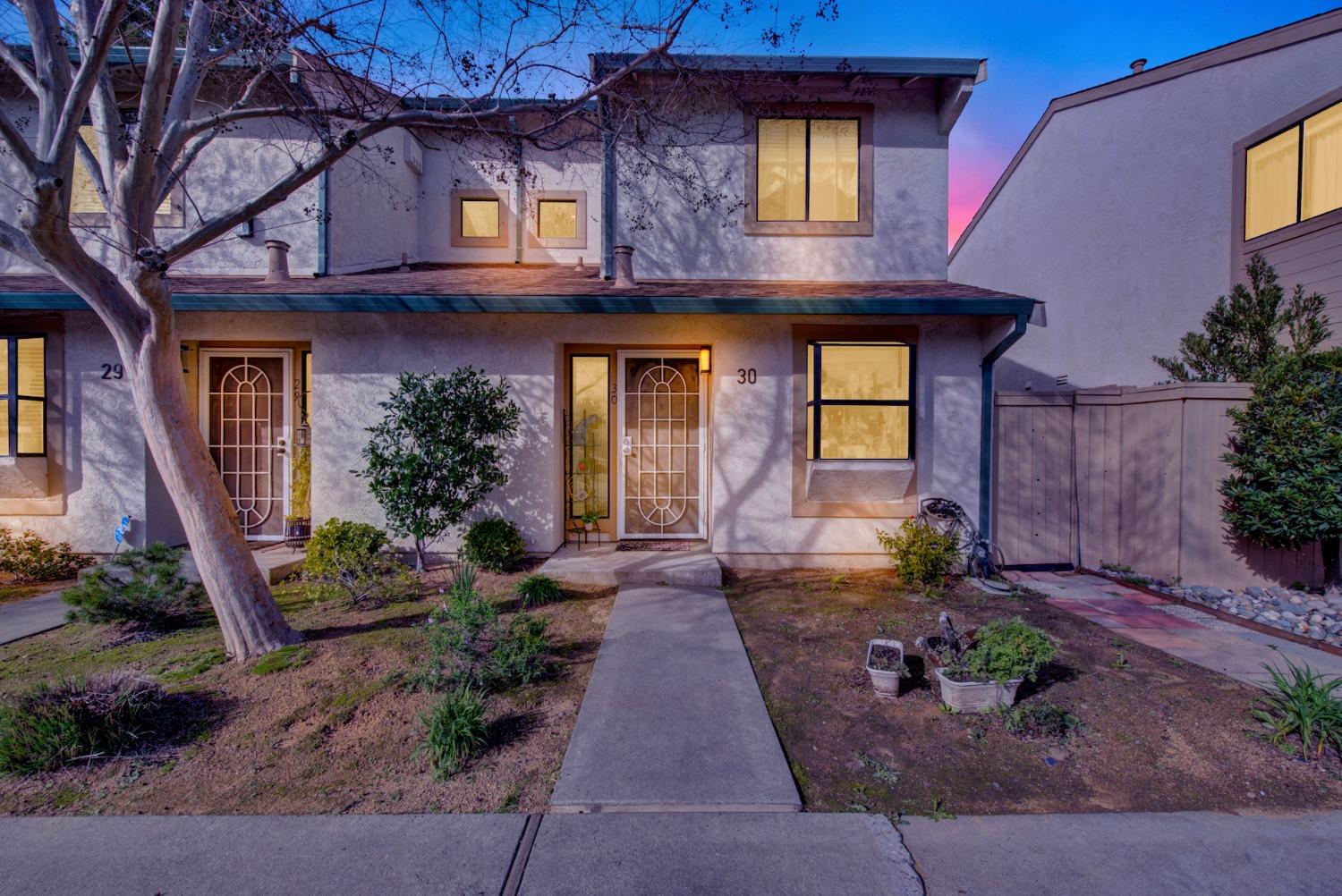2128 Bueno Drive, Unit 30 Davis, CA 95616 - Photo 1 of 1 a front view of a house