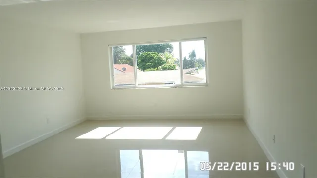a view of empty room with window
