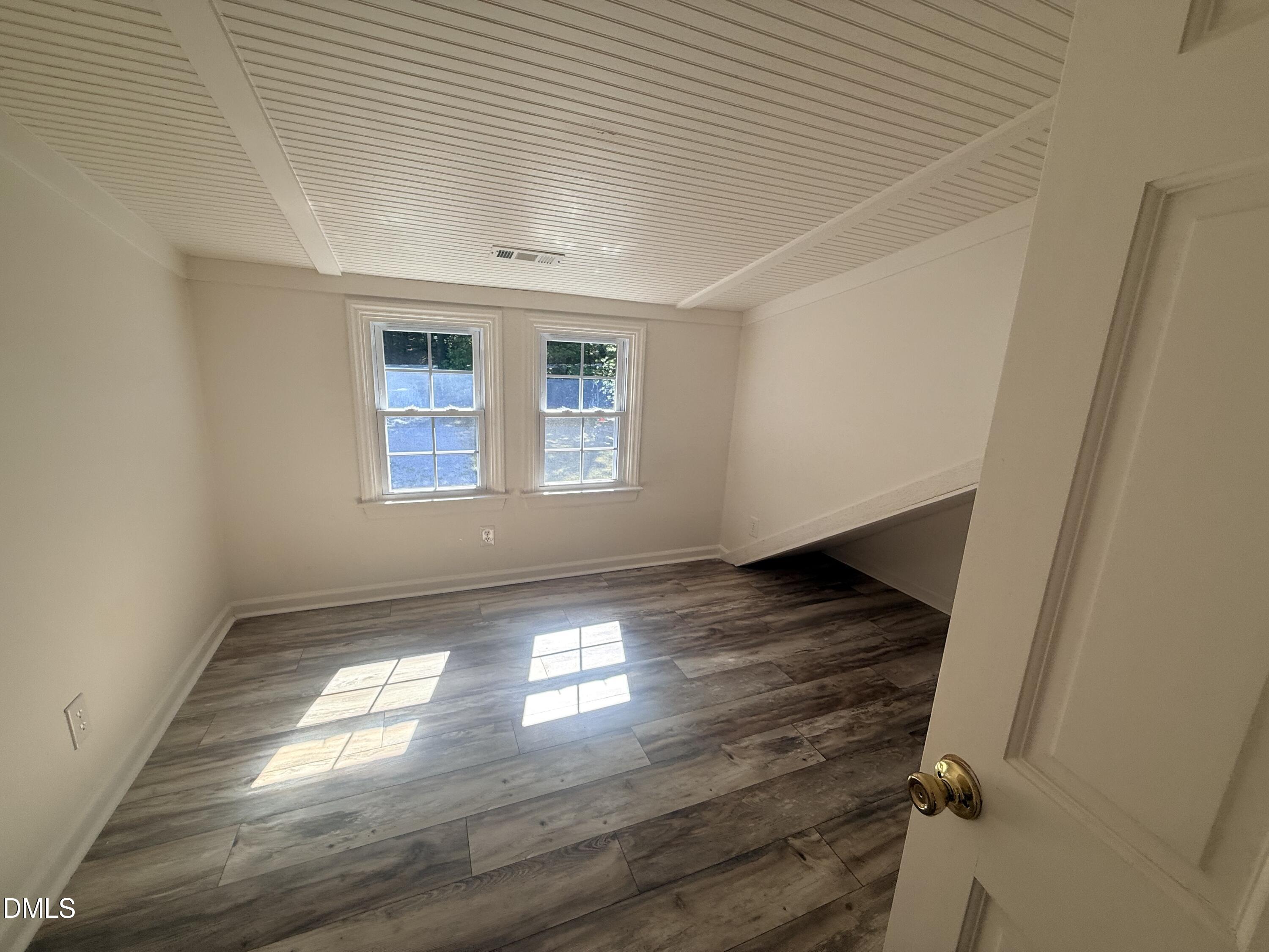 327 Shady Oak Road Roxboro, NC 27574 - Photo 47 of 62 a view of an empty room and window