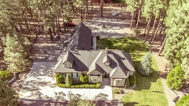 a aerial view of residential houses with outdoor space