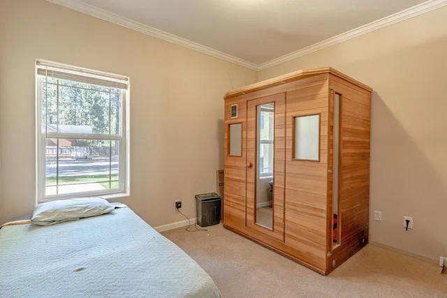 a view of a livingroom with an empty space and window