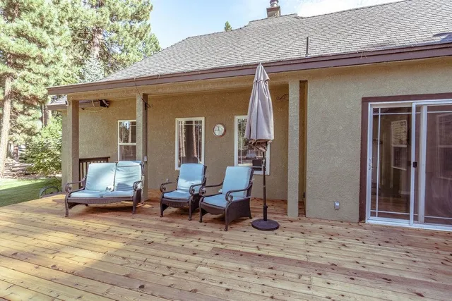 a view of outdoor space with deck and patio