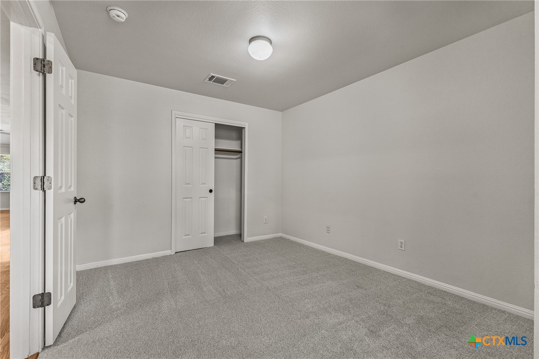 7733 Little Deer Trail Georgetown, TX 78628 - Photo 12 of 36 a view of an empty room