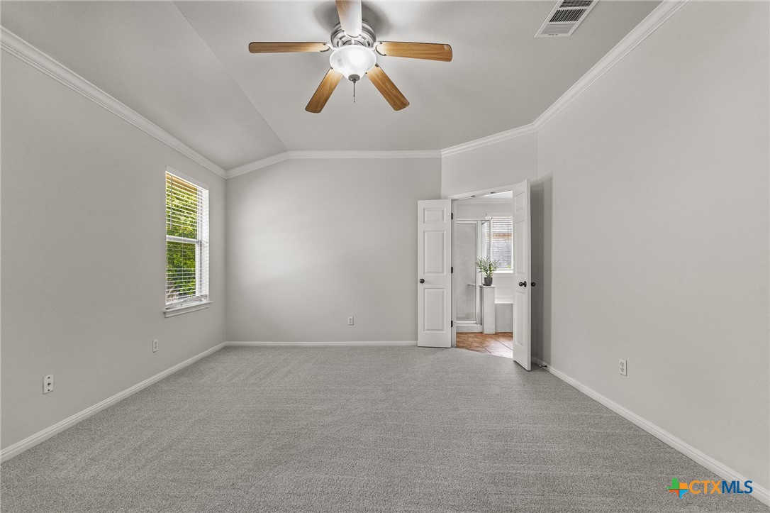7733 Little Deer Trail Georgetown, TX 78628 - Photo 19 of 36 a view of an empty room with a window