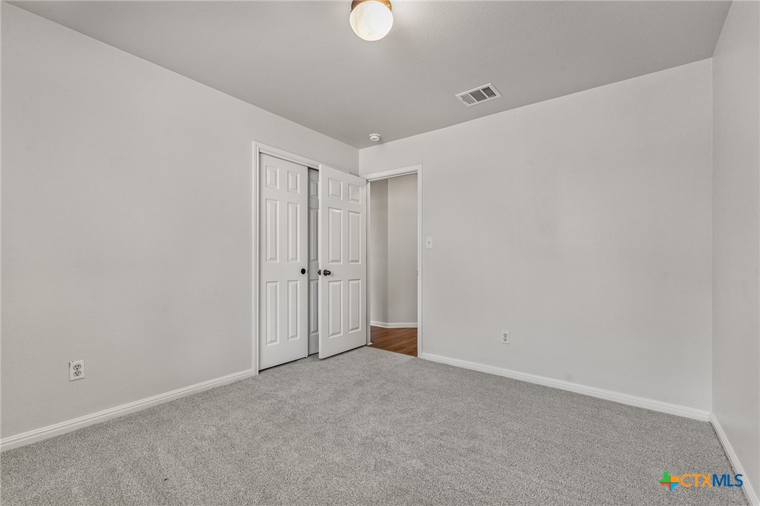 7733 Little Deer Trail Georgetown, TX 78628 - Photo 31 of 36 a view of an empty room