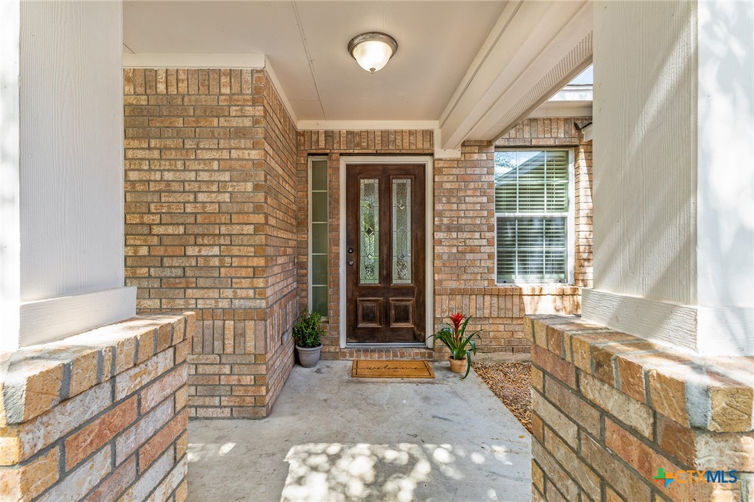 7733 Little Deer Trail Georgetown, TX 78628 - Photo 6 of 36 a view of entrance with stairs