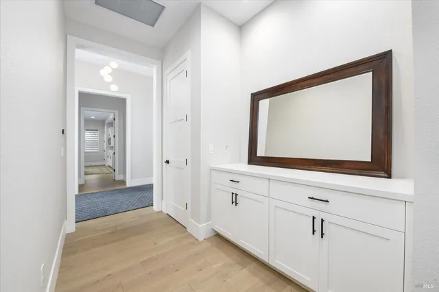 a view of a patio with a table and chairs