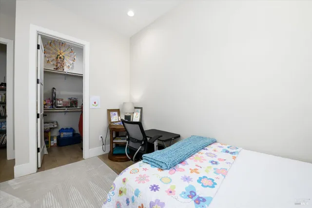 a view of a balcony with sitting area