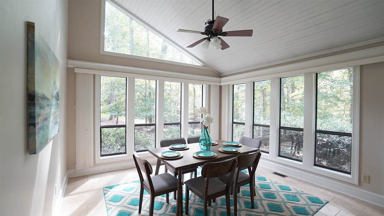 10517 Whitestone Road Raleigh, NC 27615 - Photo 11 of 30 This area is so wonderful and bright with all the windows. Perfect for a huge family table or for both a sitting area and eating area. You will love this room. Kitchen Eating Area