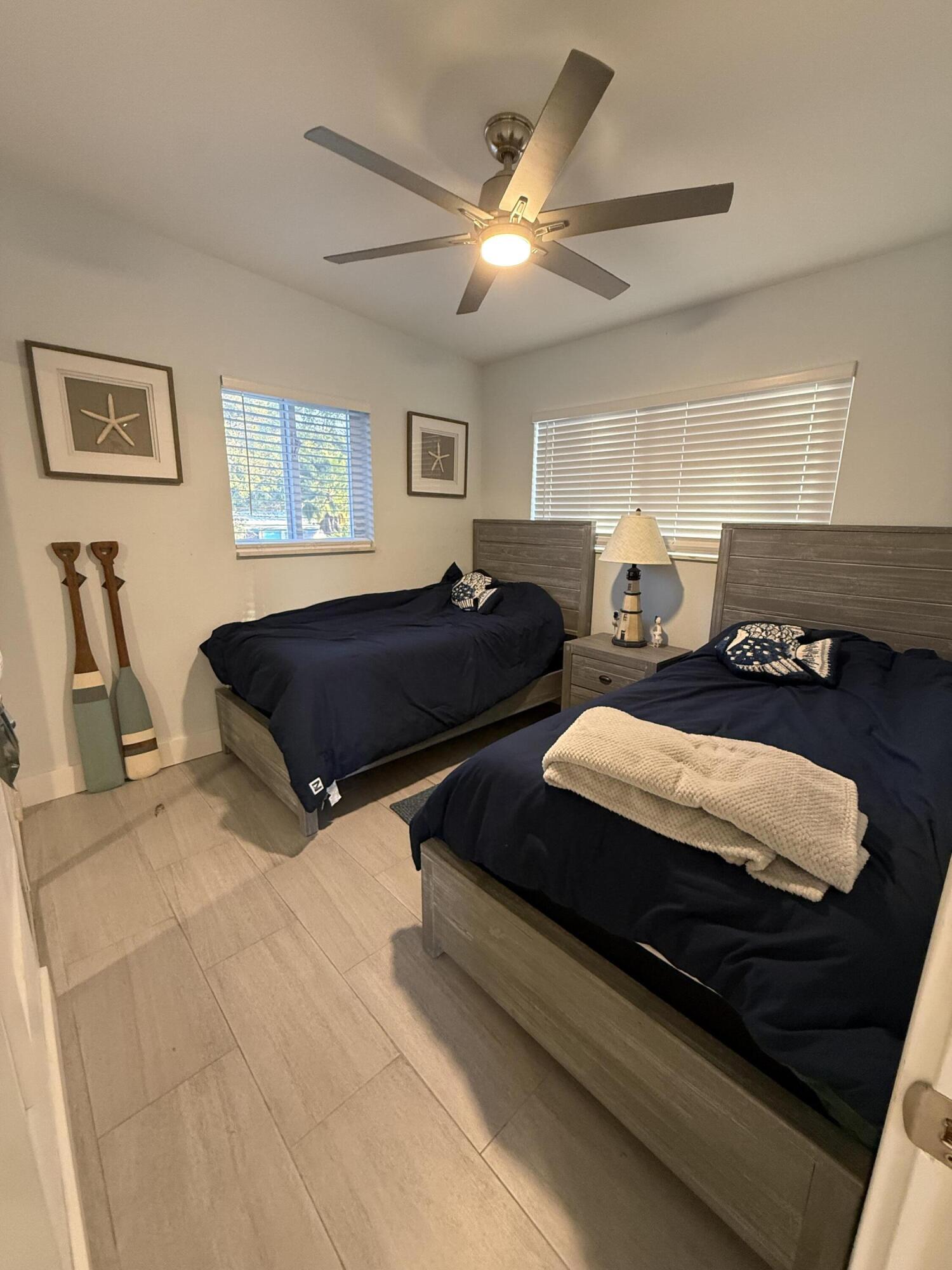 116 Long Ben Drive Key Largo, FL 33037 - Photo 13 of 26 a living room with furniture and a window