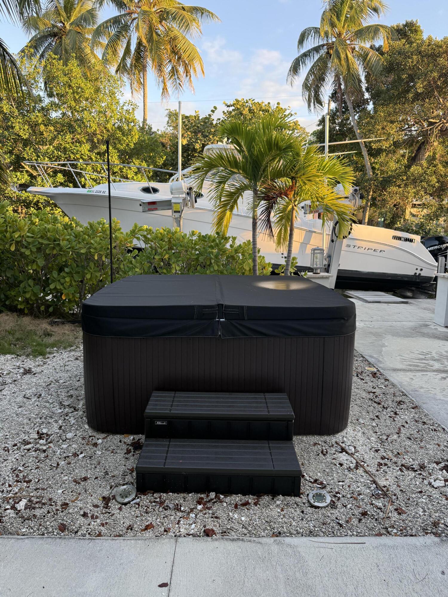 116 Long Ben Drive Key Largo, FL 33037 - Photo 18 of 26 a view of a bench in the patio