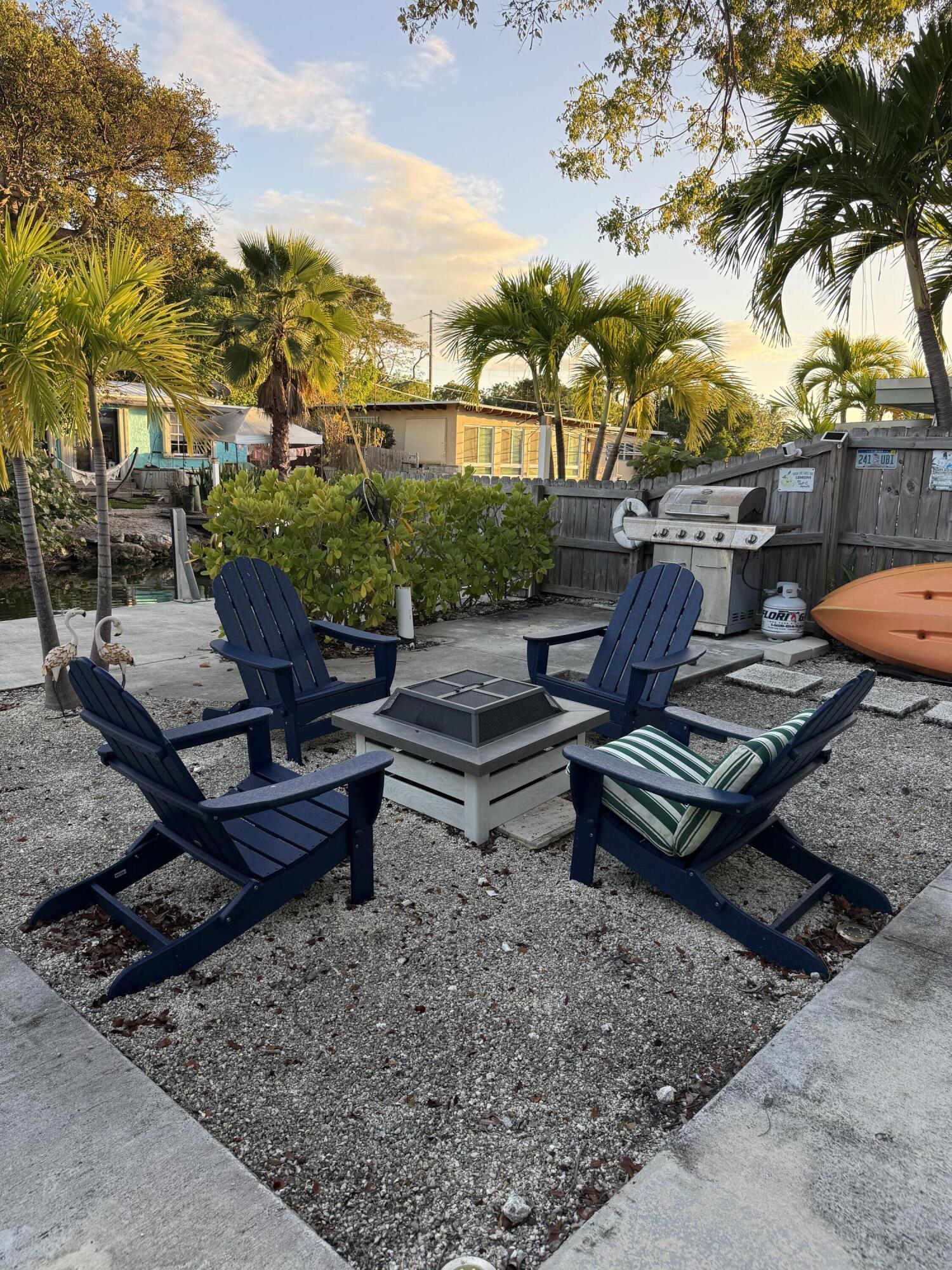116 Long Ben Drive Key Largo, FL 33037 - Photo 20 of 26 a roof deck with couches and city view