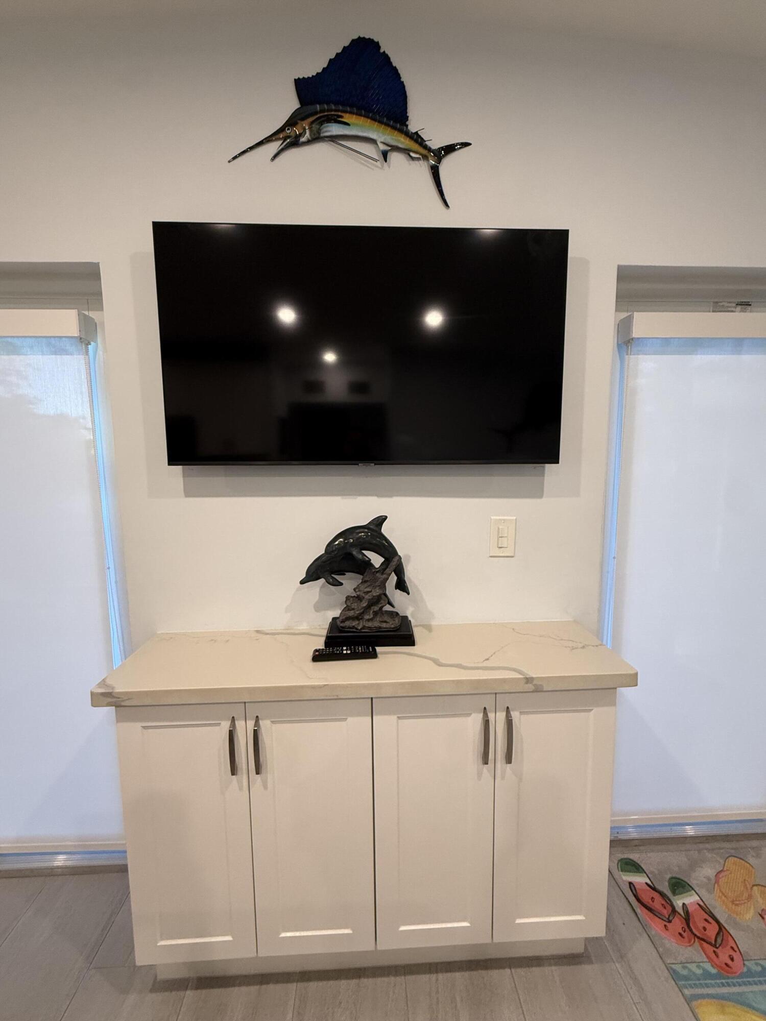 116 Long Ben Drive Key Largo, FL 33037 - Photo 9 of 26 a kitchen with a stove and a microwave