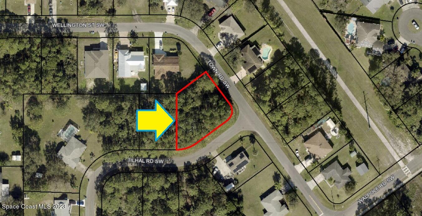 400 Tilhal Road Southwest Palm Bay, FL 32908 - Photo 3 of 6 an aerial view of a houses with yard