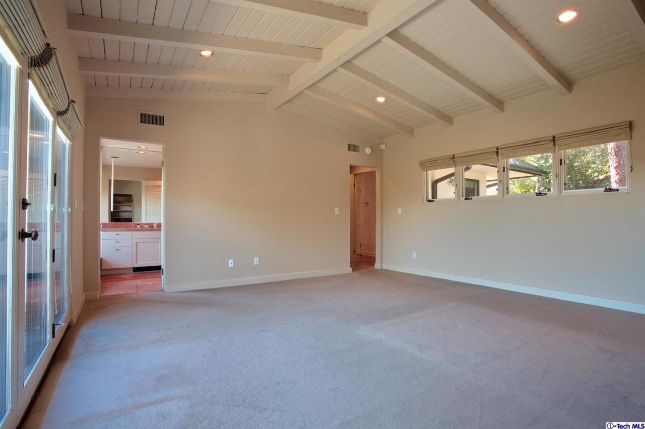 1114 Heatherside Road Pasadena, CA 91105 - Photo 16 of 35 an empty room with windows and closet