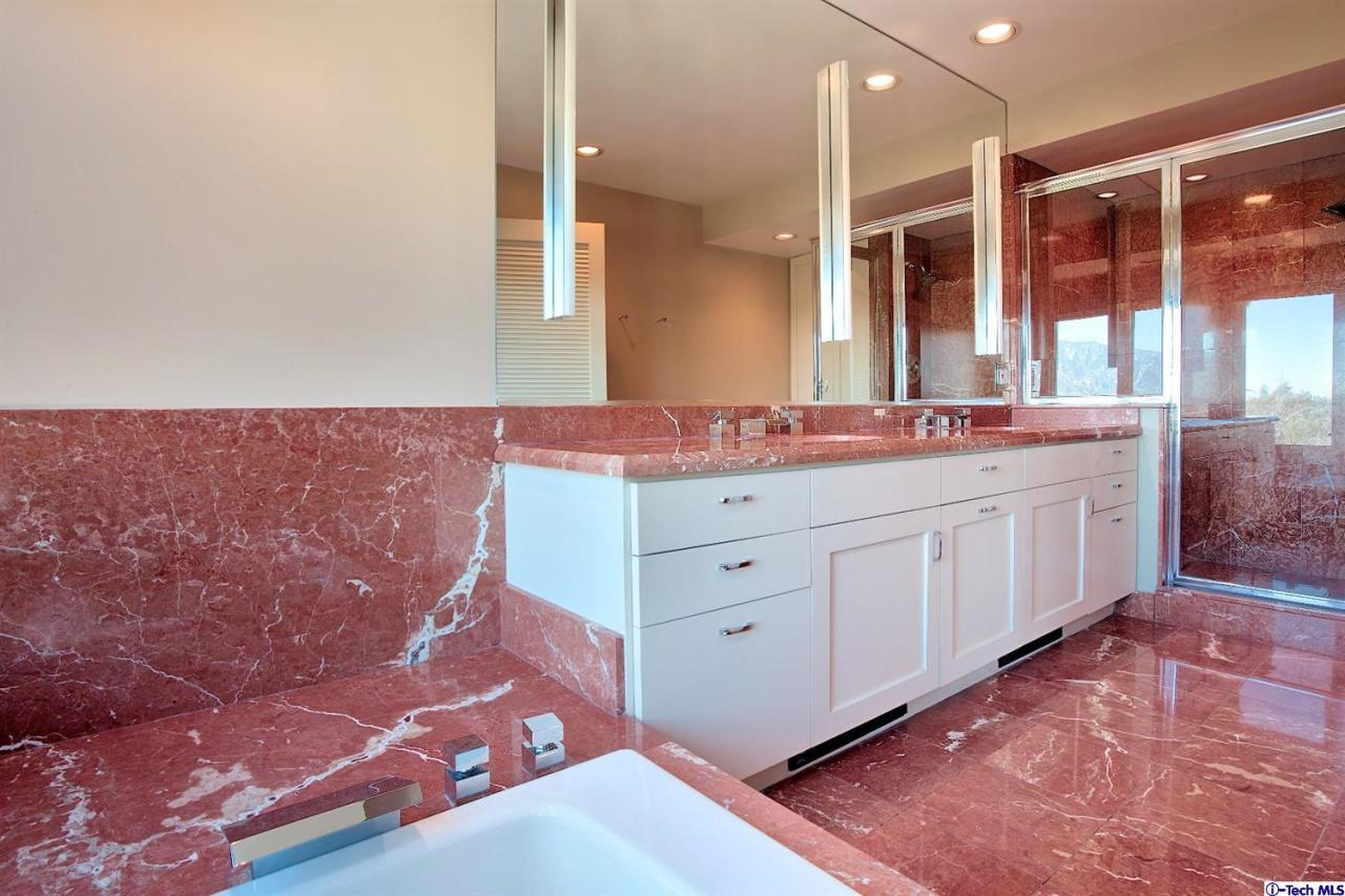 1114 Heatherside Road Pasadena, CA 91105 - Photo 19 of 35 a spacious bathroom with a double vanity sink mirror and