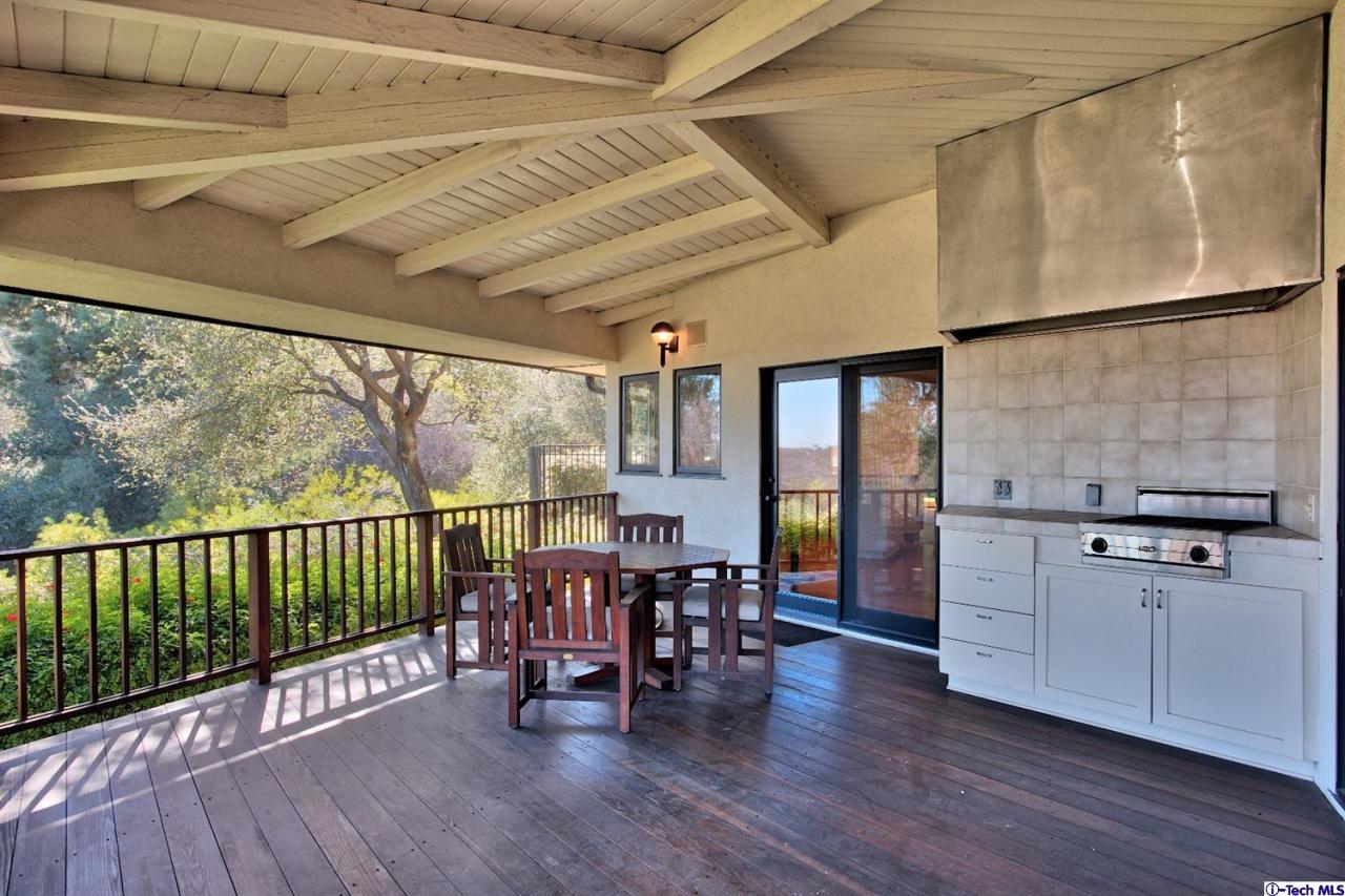1114 Heatherside Road Pasadena, CA 91105 - Photo 27 of 35 a view of a chairs and table in kitchen with wooden floor