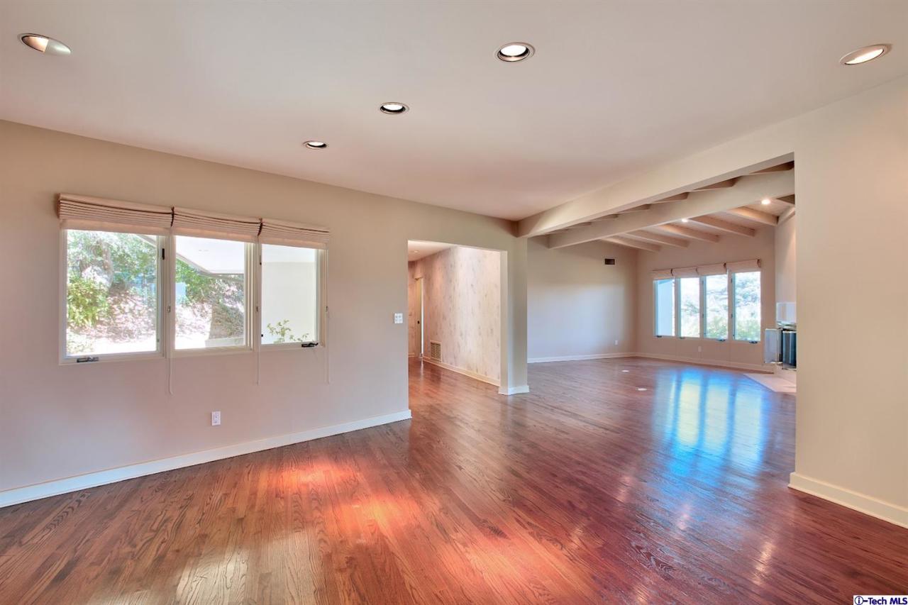 1114 Heatherside Road Pasadena, CA 91105 - Photo 6 of 35 a view of an empty room with wooden floor and a window