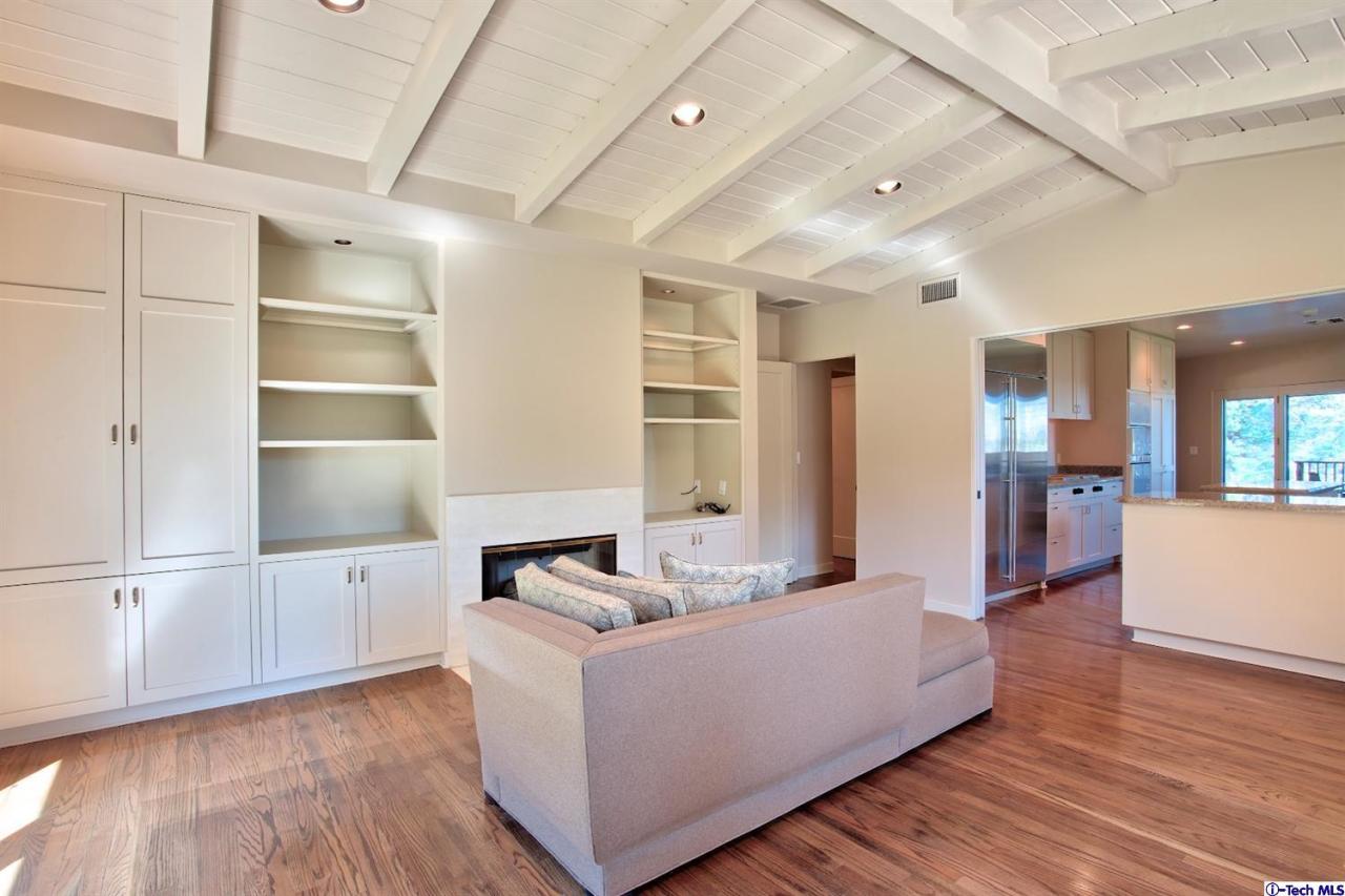 1114 Heatherside Road Pasadena, CA 91105 - Photo 8 of 35 a living room with furniture cabinets and wooden floor