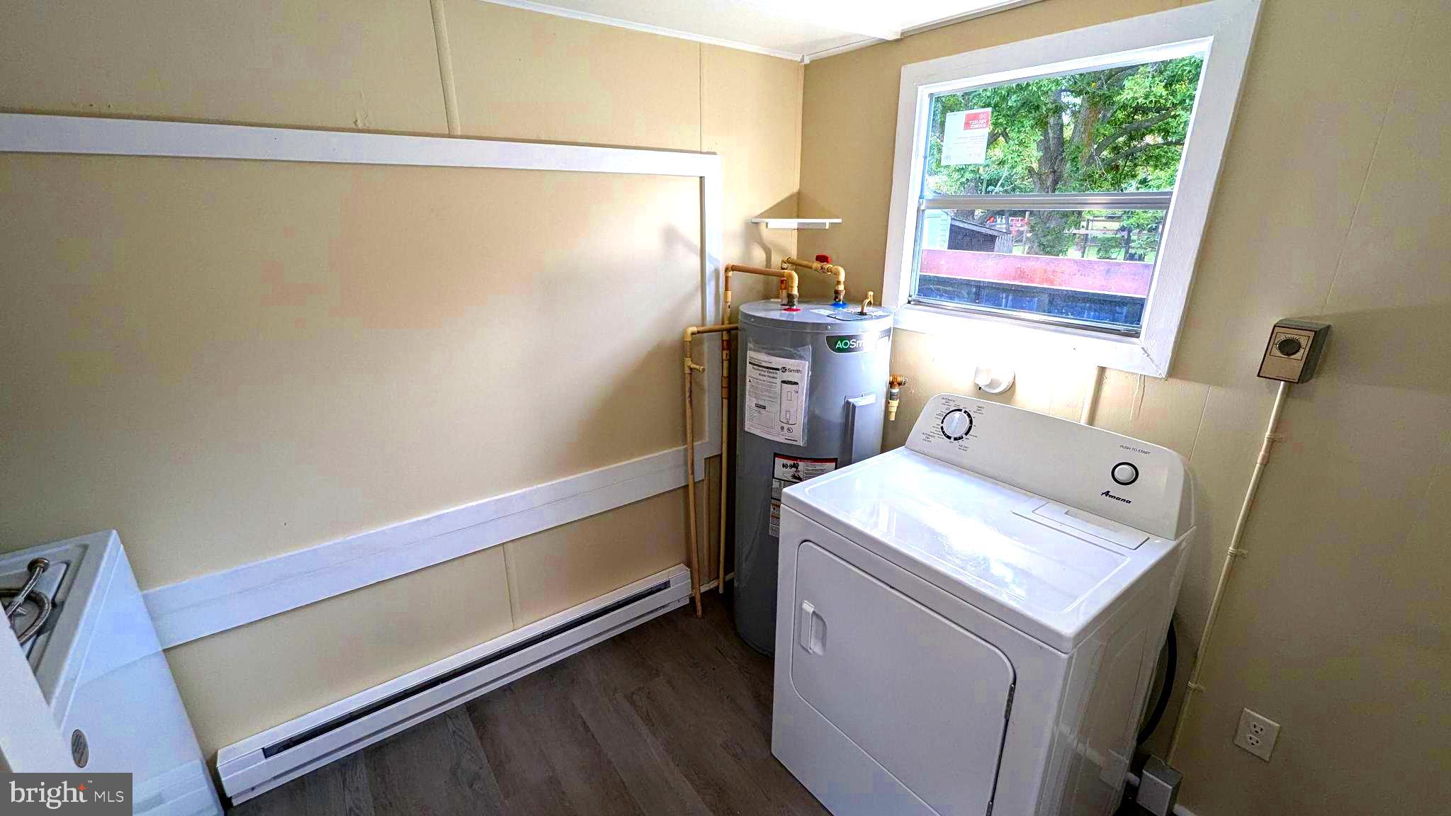23232 Lola Wheatley Road Deal Island, MD 21821 - Photo 23 of 51 a utility room with dryer and washer