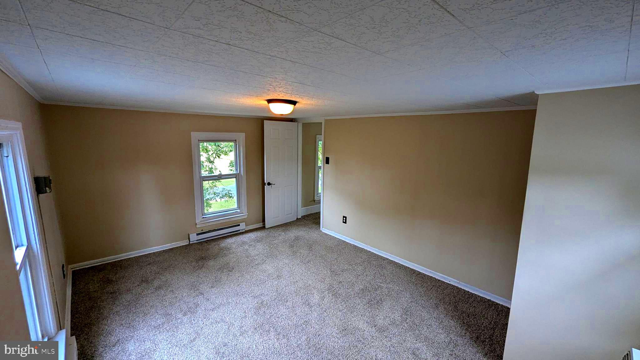 23232 Lola Wheatley Road Deal Island, MD 21821 - Photo 30 of 51 an empty room with windows