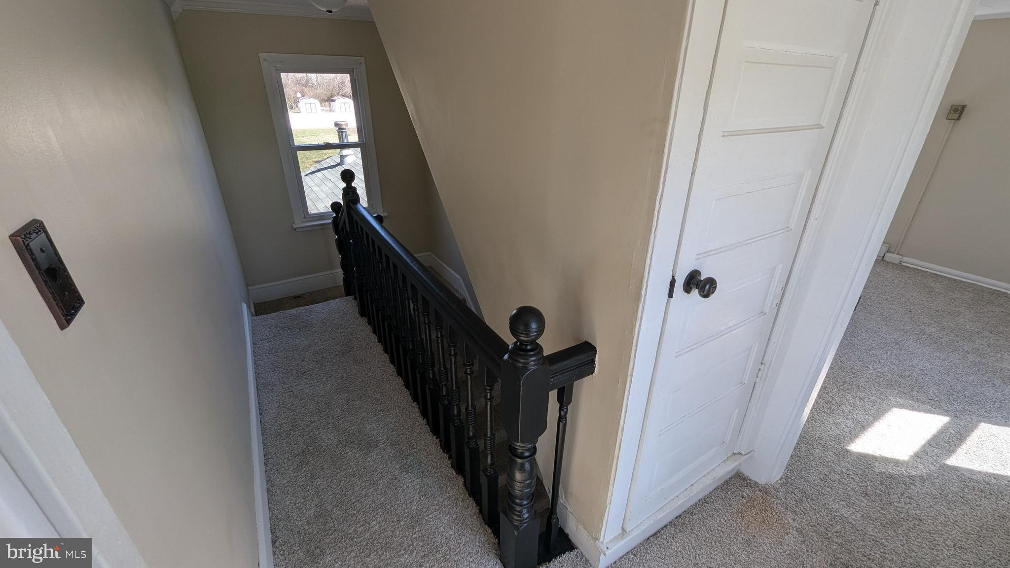 23232 Lola Wheatley Road Deal Island, MD 21821 - Photo 42 of 51 a view of a hallway with windows
