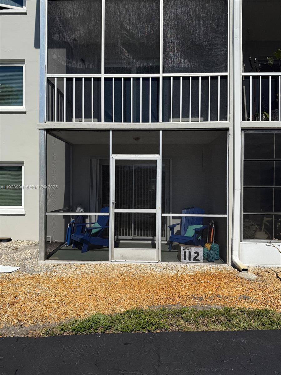 649 South Tamiami Trail, Unit 112 Venice, FL 34285 - Photo 3 of 25 a view of outdoor space with seating area