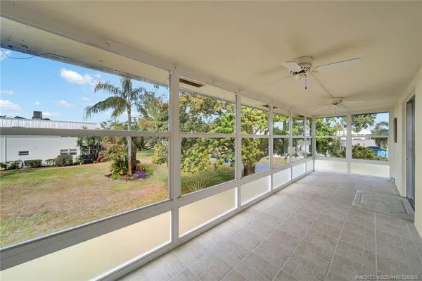 a view of a porch and garden