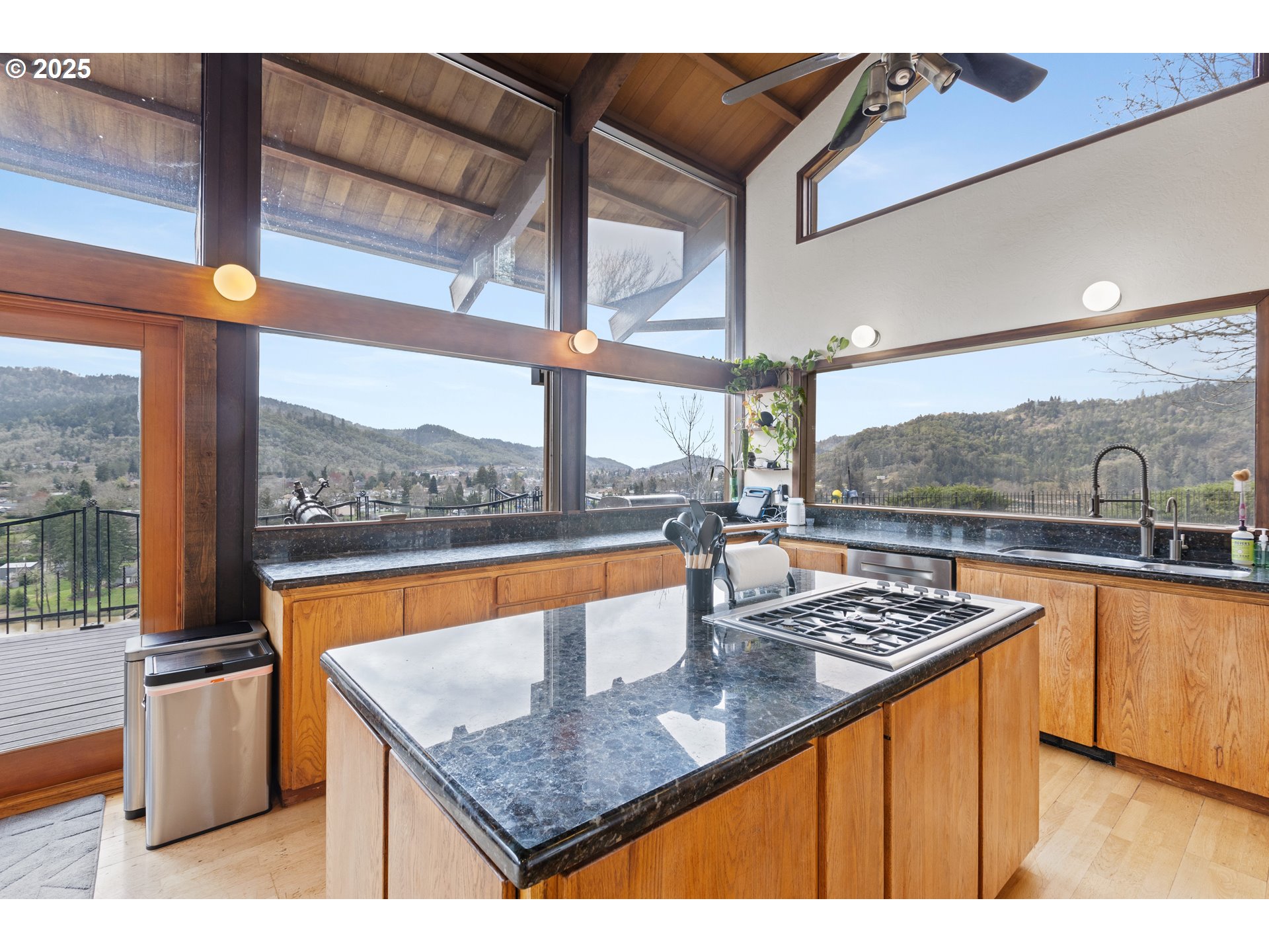141 Umpqua College Road Roseburg, OR 97470 - Photo 11 of 45 a kitchen with stainless steel appliances granite countertop a sink and a counter top space
