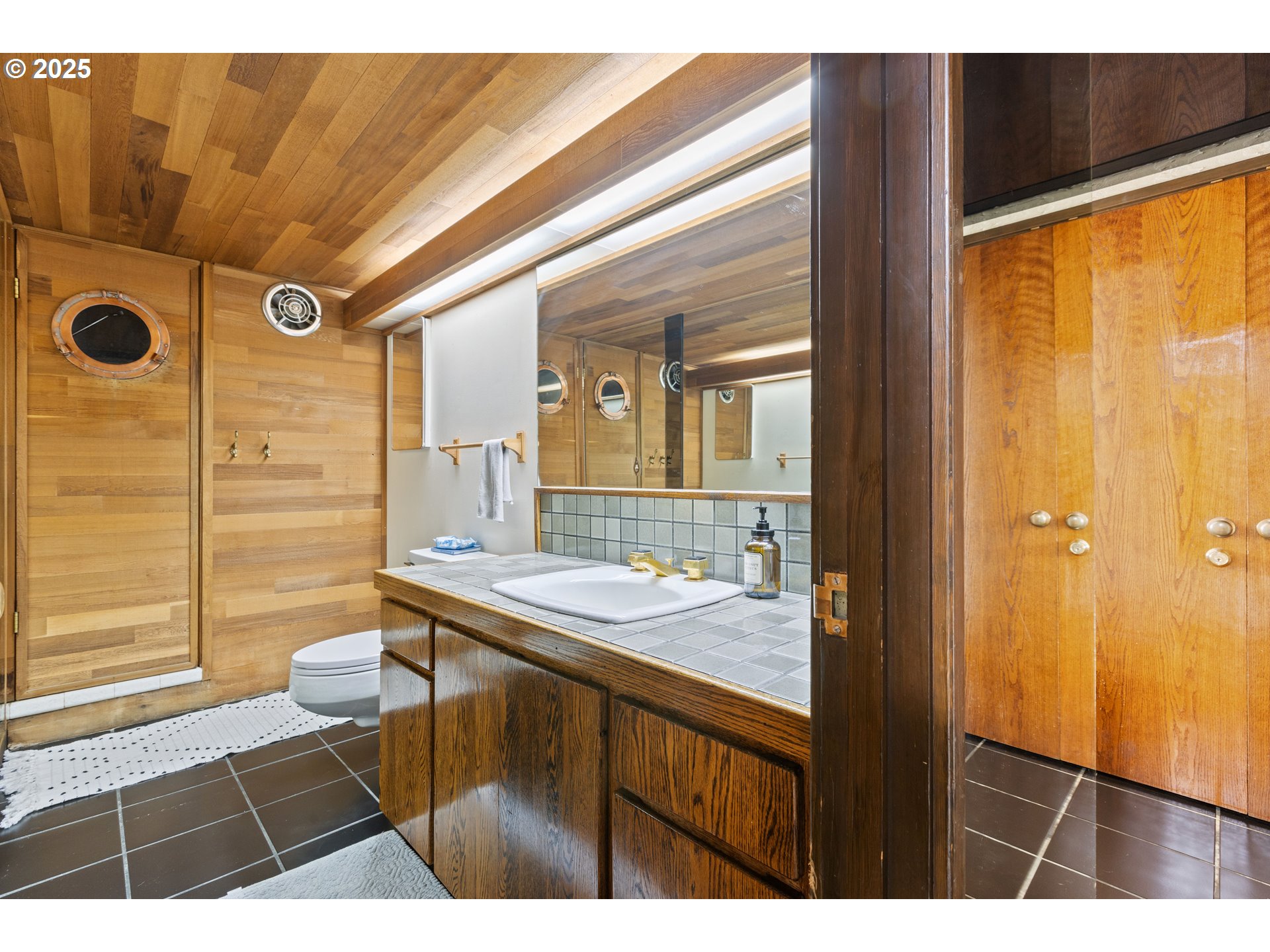 141 Umpqua College Road Roseburg, OR 97470 - Photo 20 of 45 a bathroom with a sink a mirror and a shower