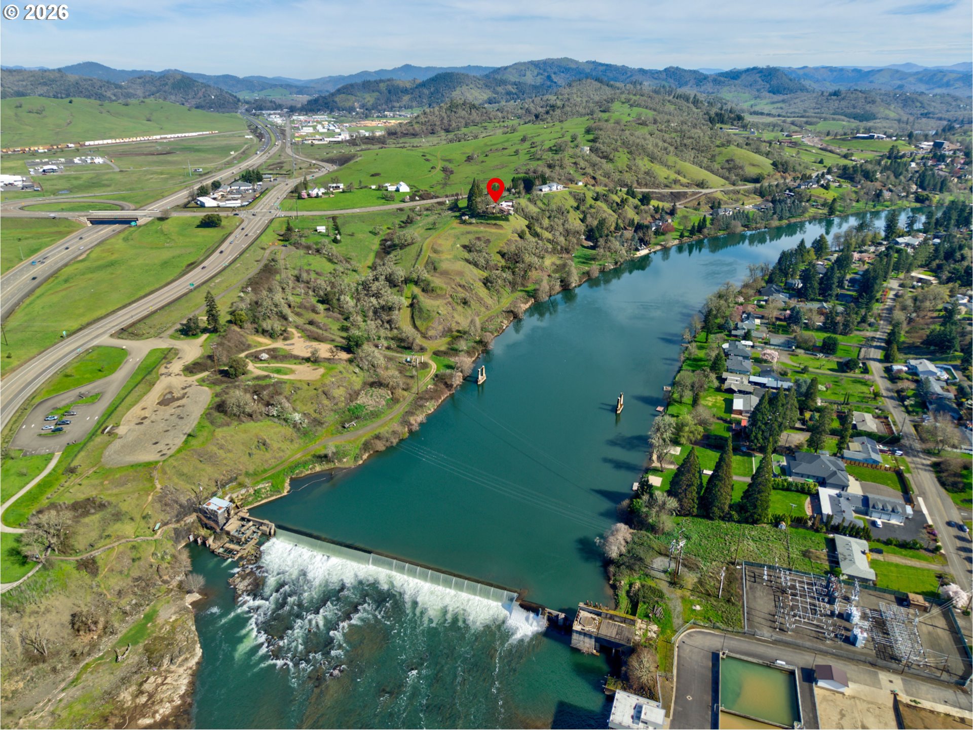 141 Umpqua College Road Roseburg, OR 97470 - Photo 2 of 45 a view of a city with a lake