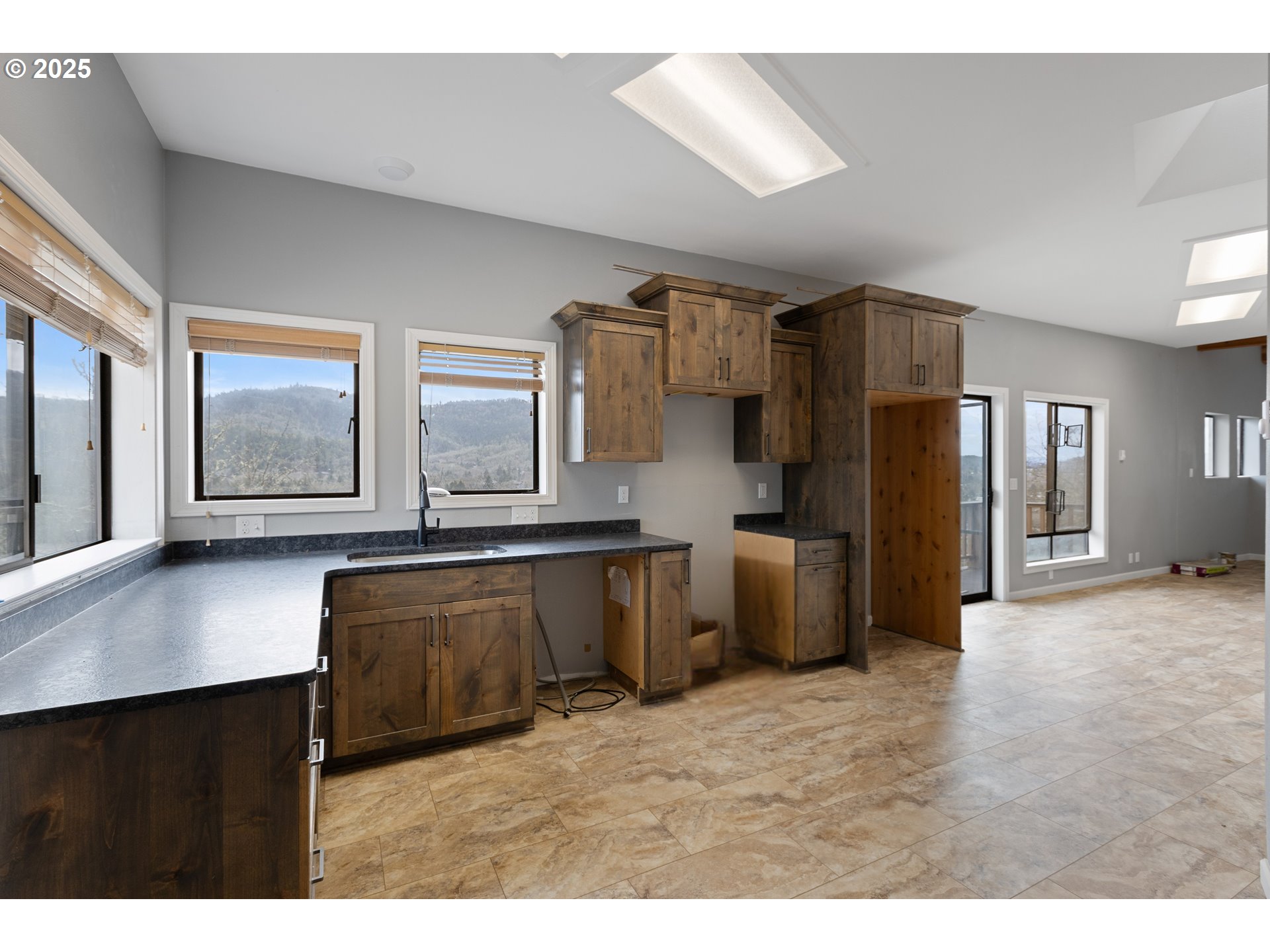 141 Umpqua College Road Roseburg, OR 97470 - Photo 27 of 45 a kitchen with stainless steel appliances a refrigerator and a stove top oven