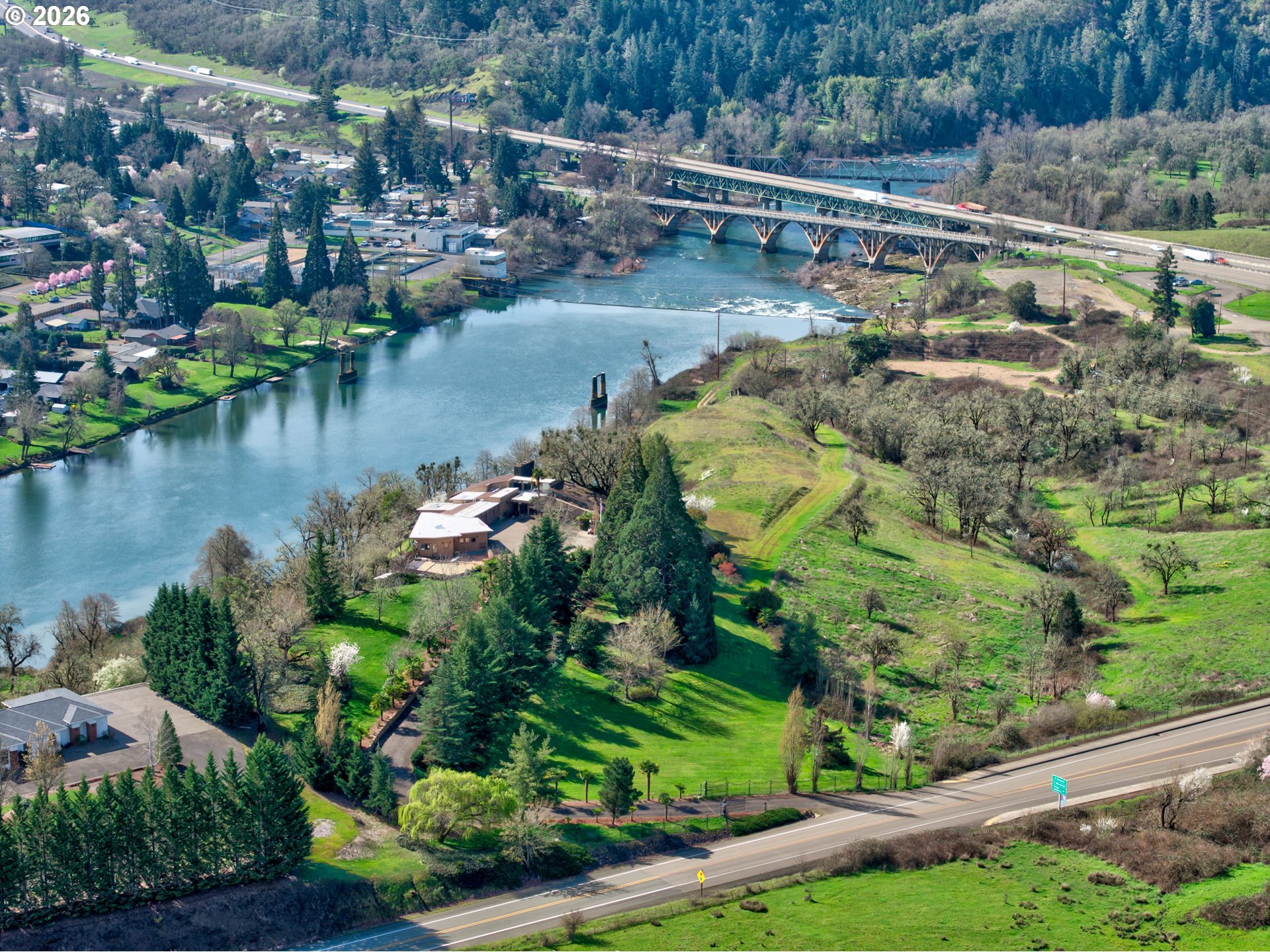 141 Umpqua College Road Roseburg, OR 97470 - Photo 41 of 45 an aerial view of residential houses with outdoor space and lake view