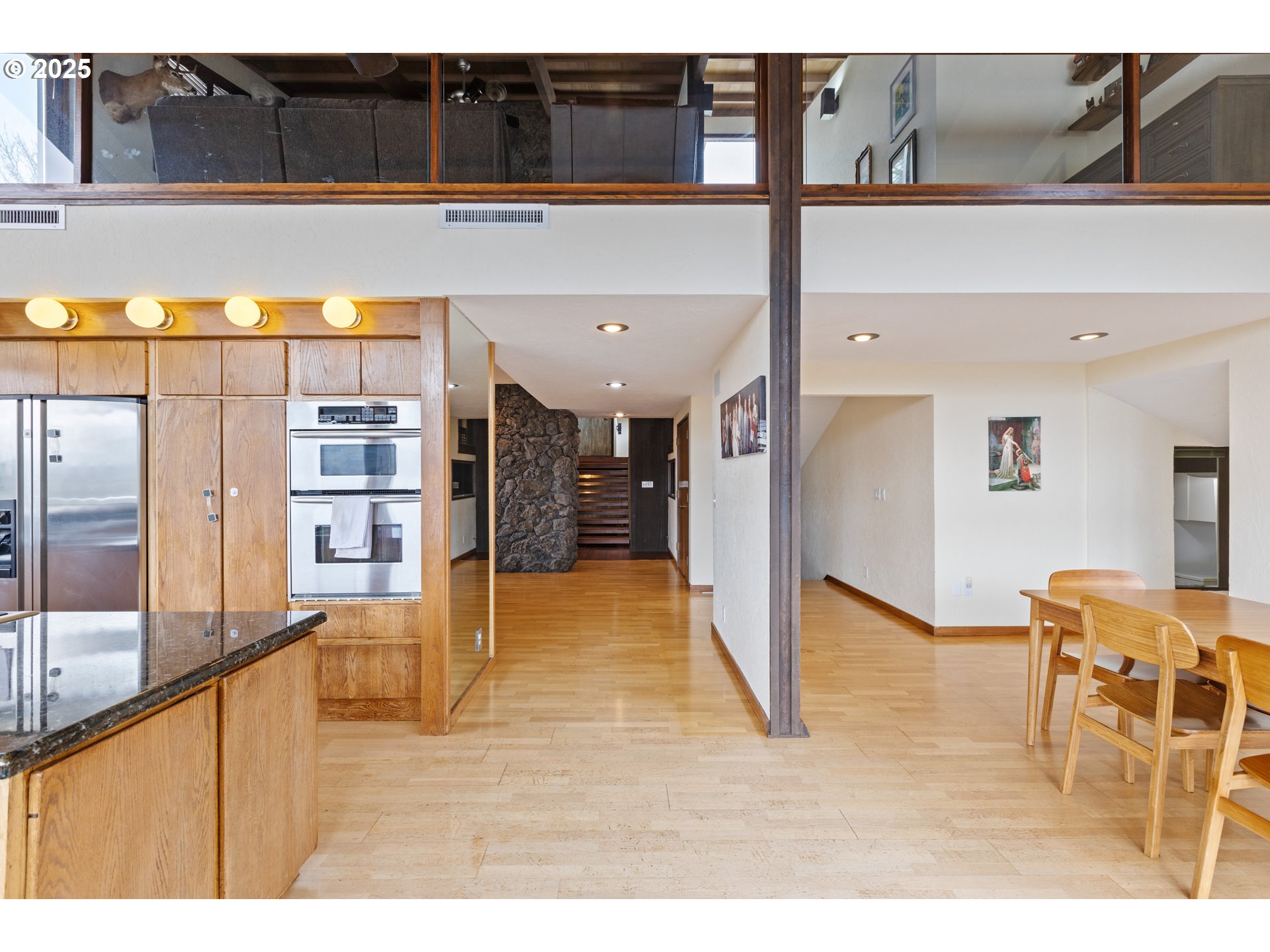 141 Umpqua College Road Roseburg, OR 97470 - Photo 10 of 45 a living room with stainless steel appliances kitchen island granite countertop a refrigerator and cabinets