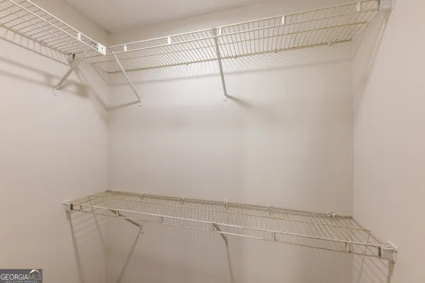 a view of a room with racks on the wall