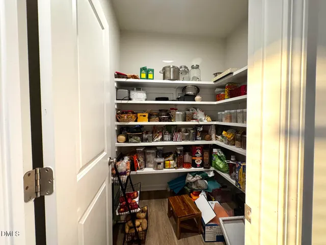 a kitchen with a stove and a cabinets
